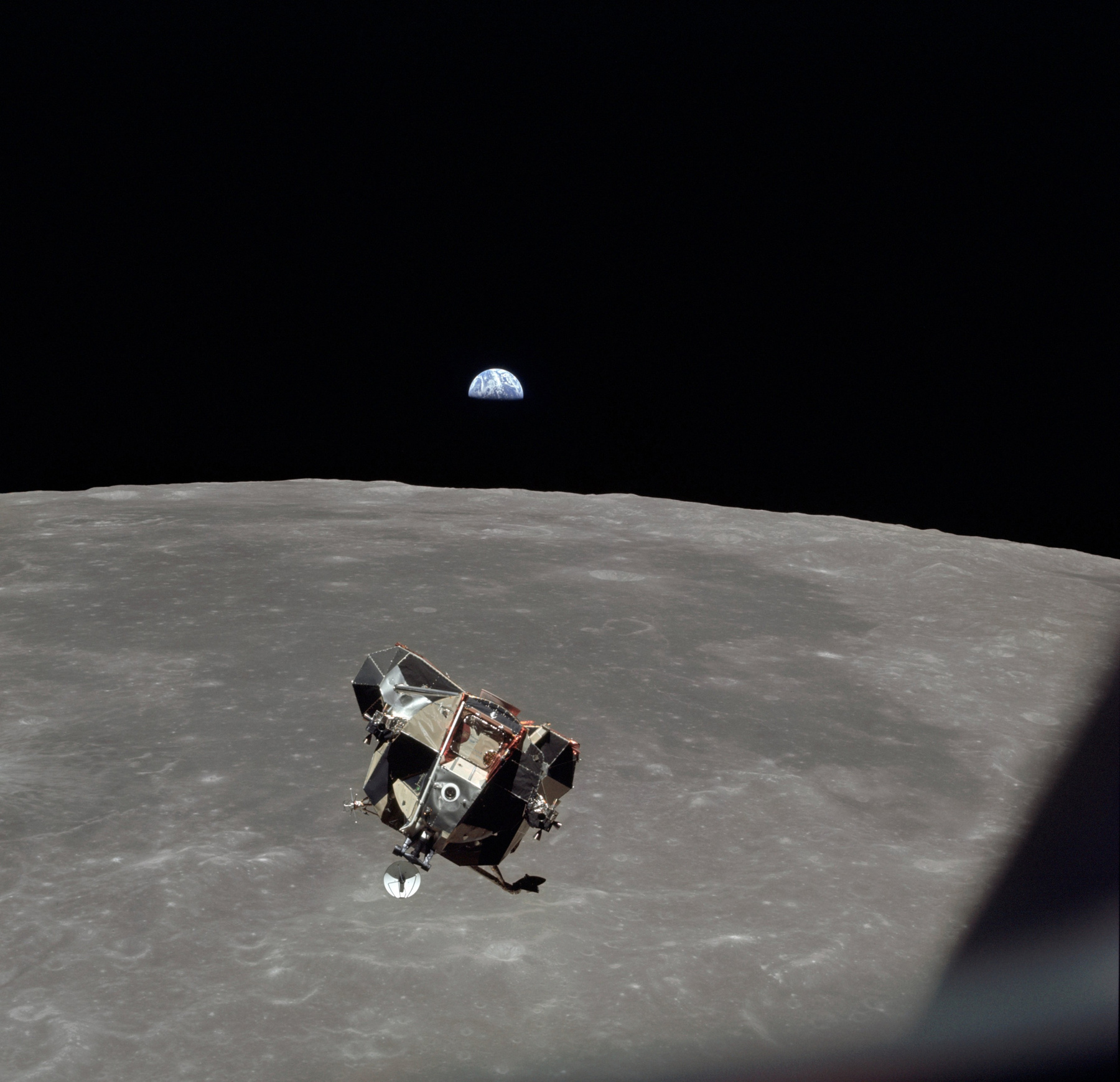 The Apollo 11 Lunar Module ascending from Moon's surface. In the background is Mare Smythii with the Earth on horizon. July 20, 1969.