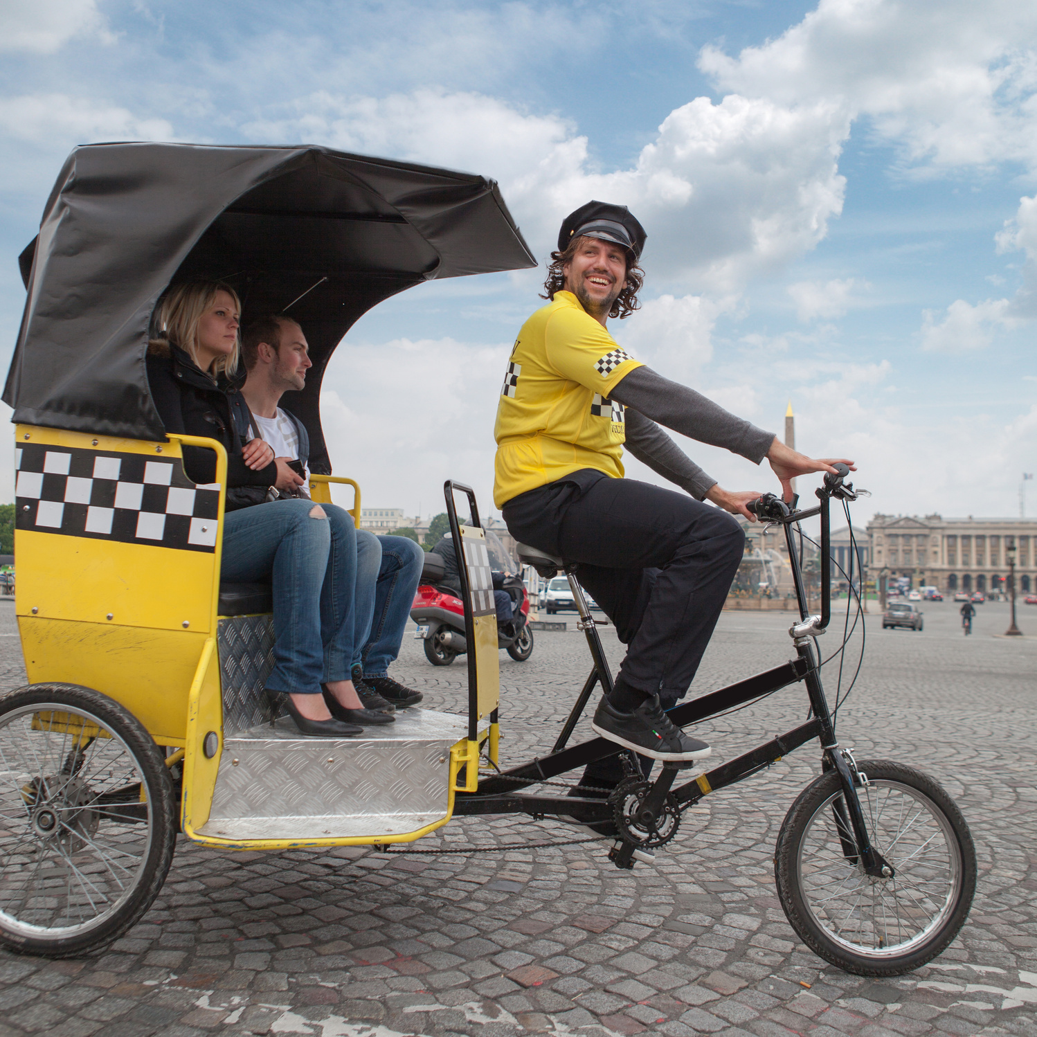 Man Driving in Bicycle Taxi